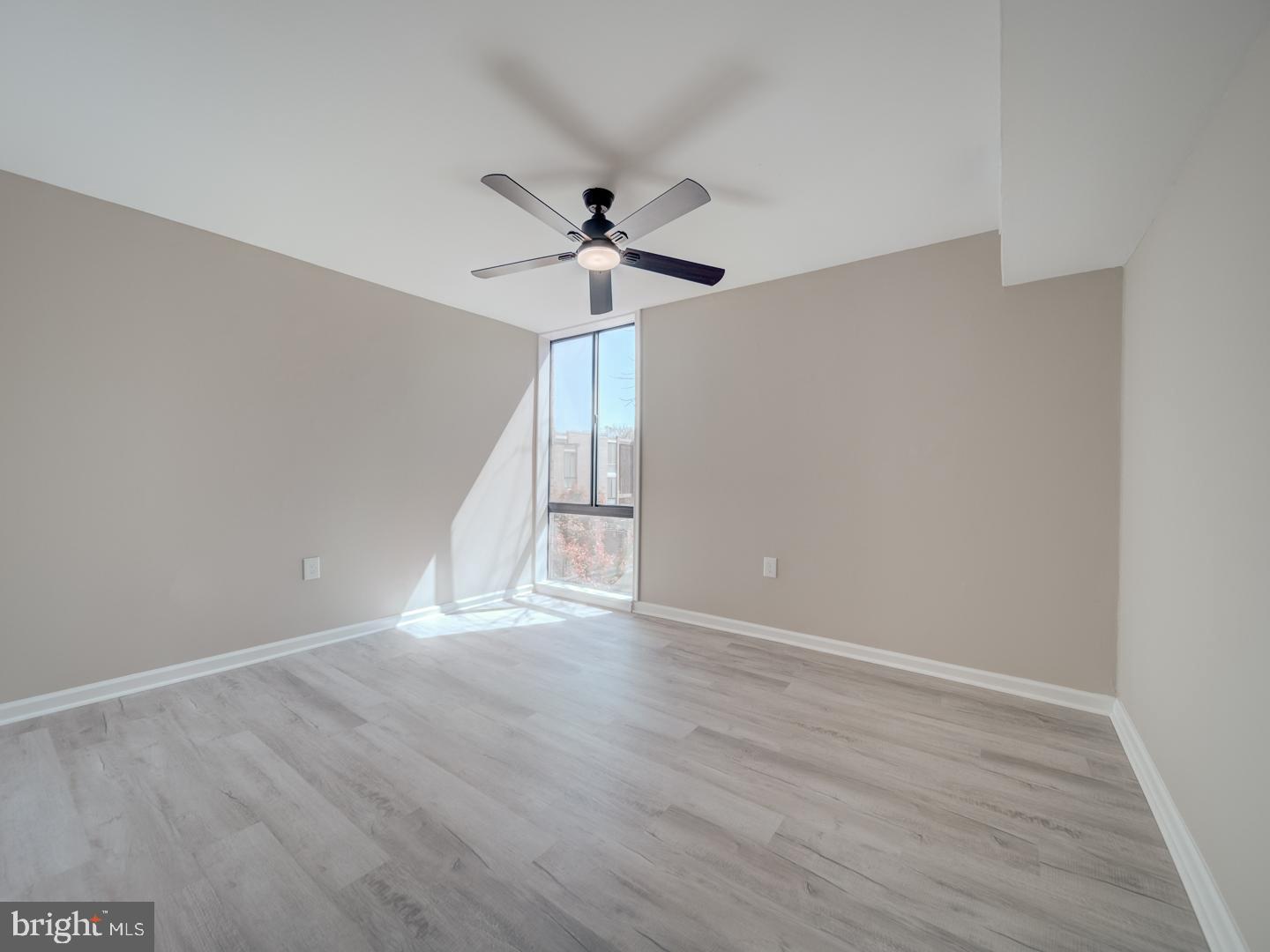 8675 Greenbelt Road, Unit 202 Greenbelt, MD 20770 - Photo 33 of 47 a view of an empty room with a window