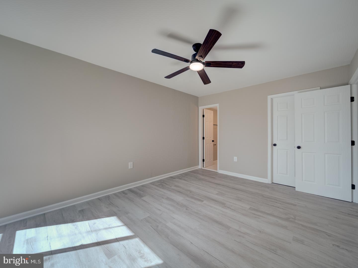 8675 Greenbelt Road, Unit 202 Greenbelt, MD 20770 - Photo 39 of 47 a view of a big room with wooden floor and windows
