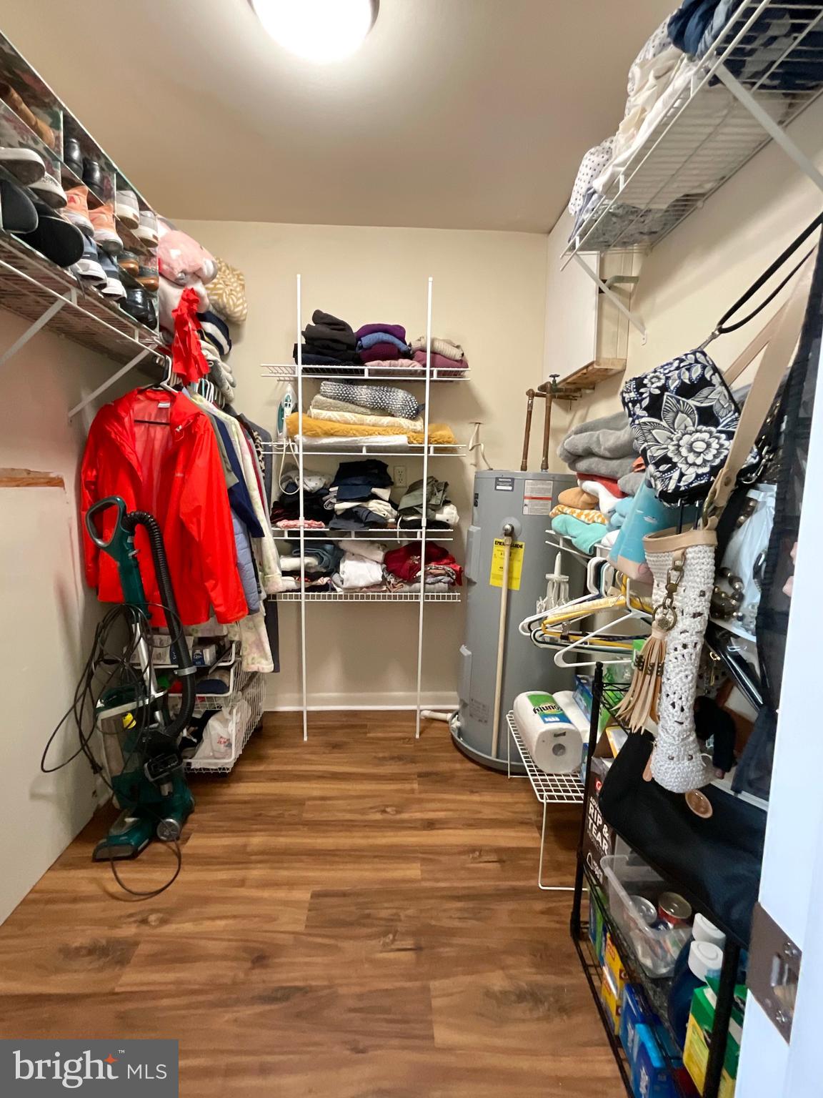 13406 Shady Knoll Drive, Unit 13406 Silver Spring, MD 20904 - Photo 17 of 27 Walk-in Closet in Primary Bedroom
