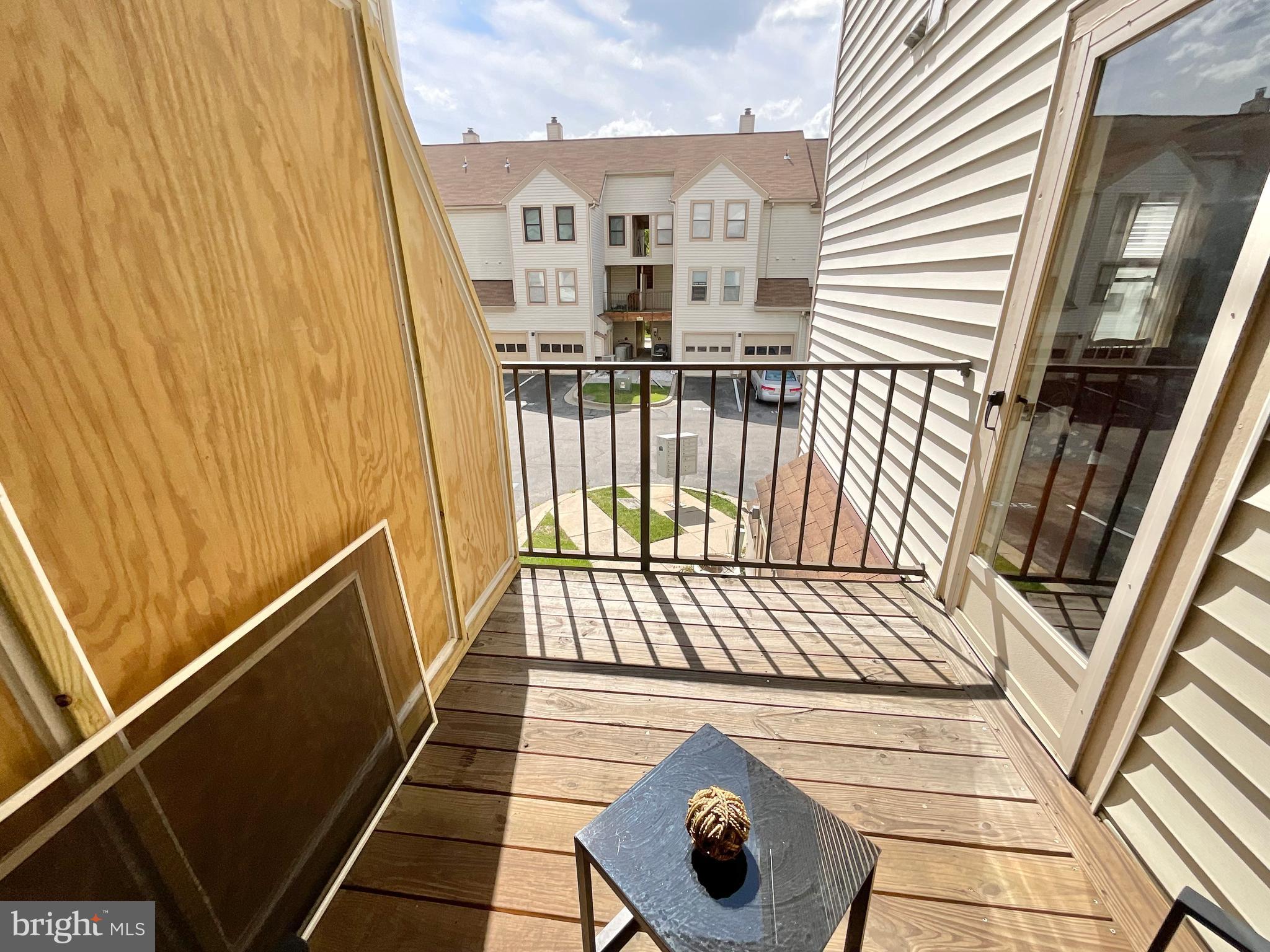 13406 Shady Knoll Drive, Unit 13406 Silver Spring, MD 20904 - Photo 22 of 27 Looking out from Balcony Porch
