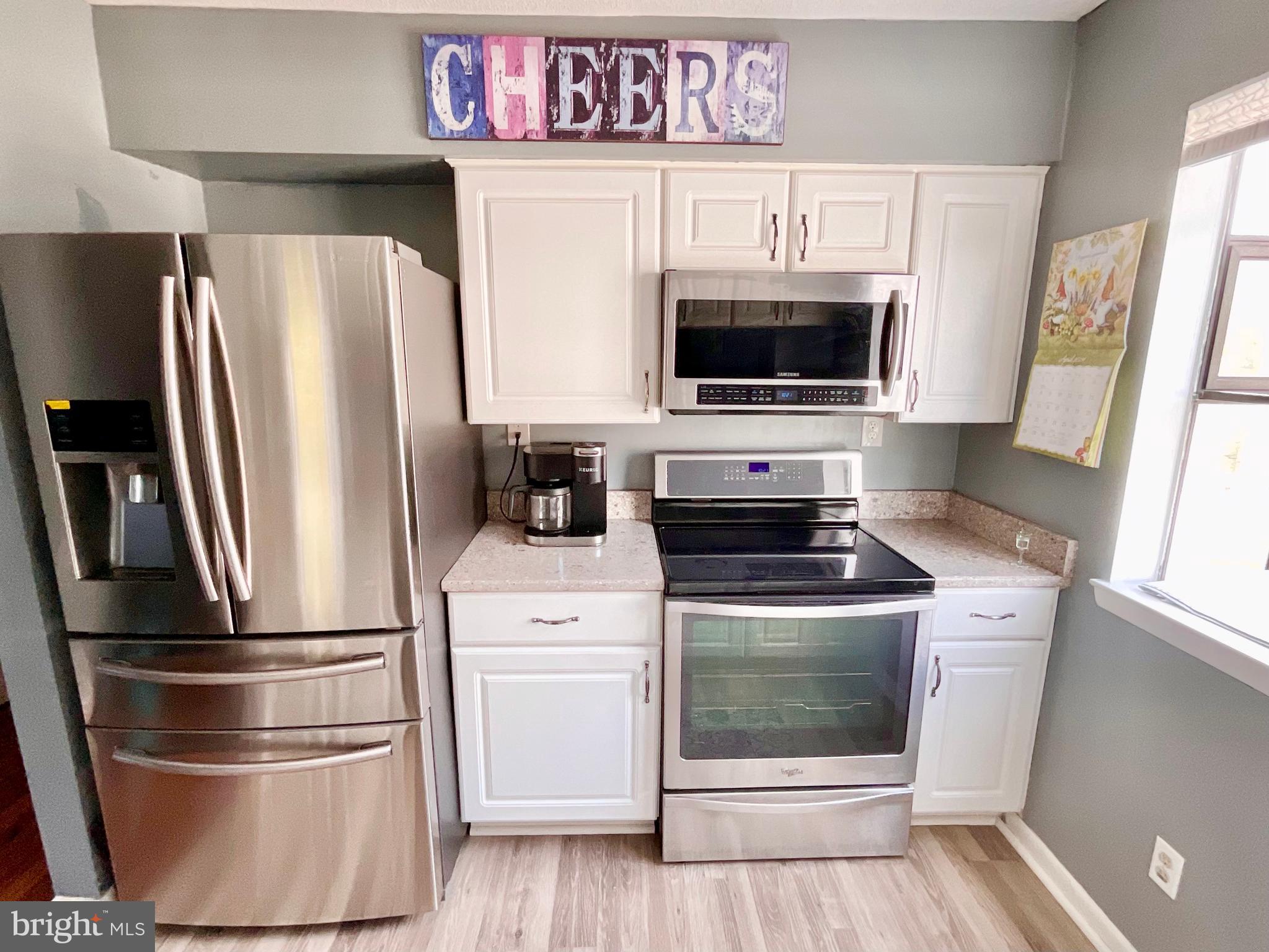13406 Shady Knoll Drive, Unit 13406 Silver Spring, MD 20904 - Photo 10 of 27 Kitchen - stove/fridge view