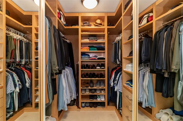 an aerial view of multiple houses with a yard