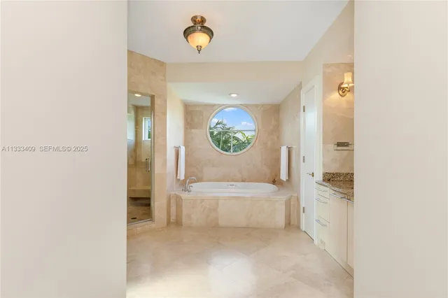 a kitchen with a stove and a refrigerator