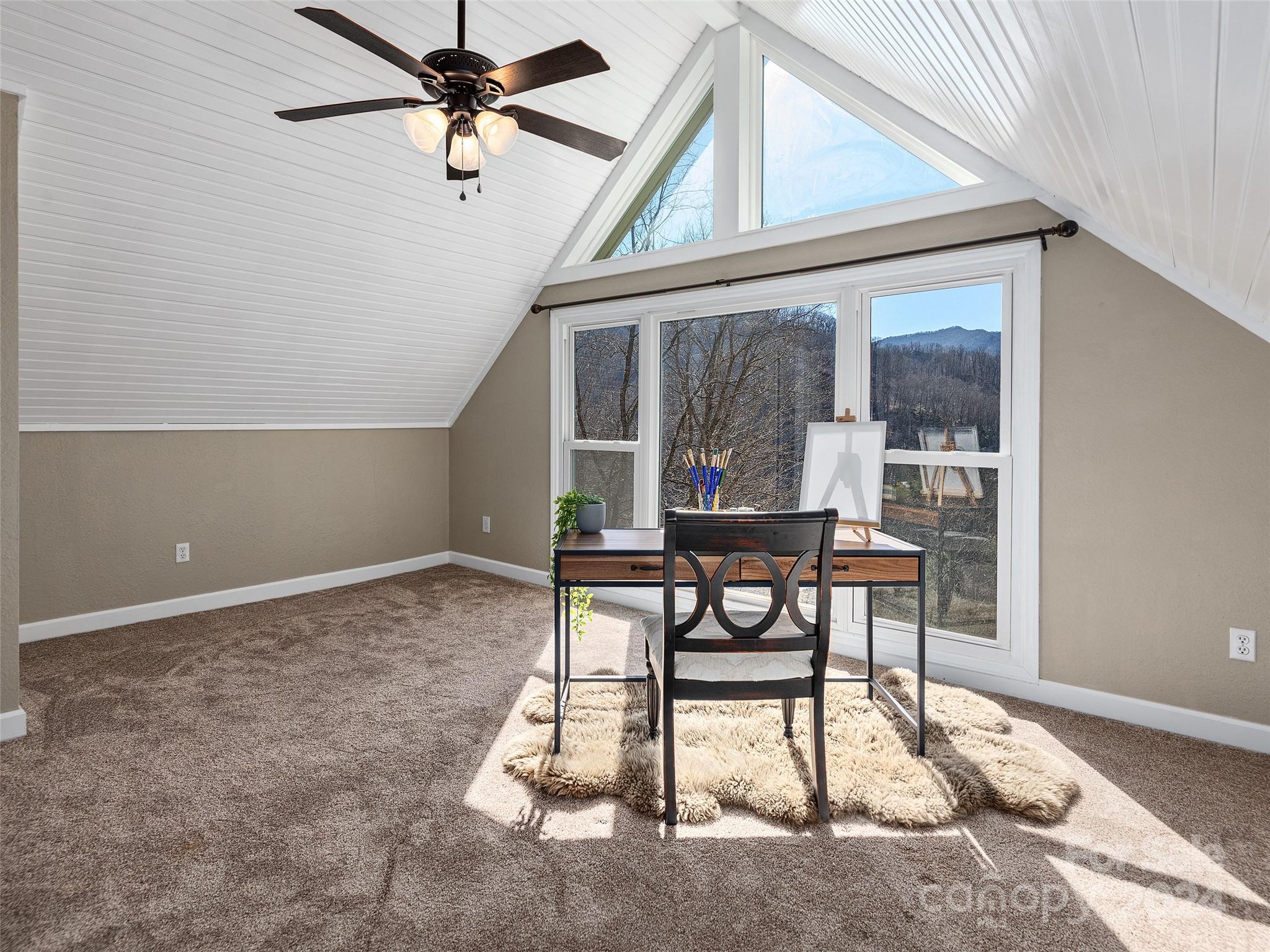 251 Jade Drive Clyde, NC 28721 - Photo 15 of 40 a workspace with chandelier