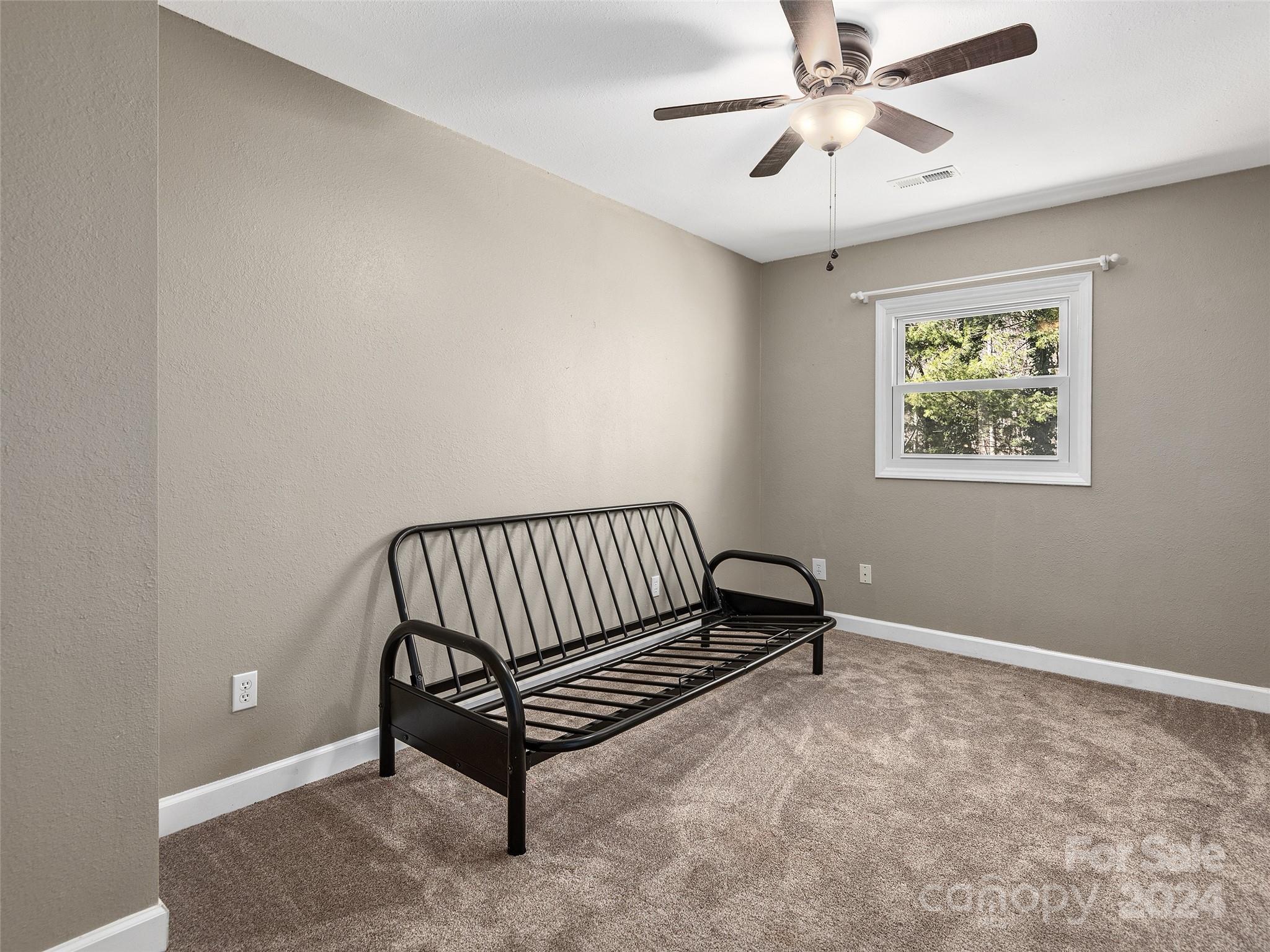 251 Jade Drive Clyde, NC 28721 - Photo 27 of 40 a view of room with stairs and a window