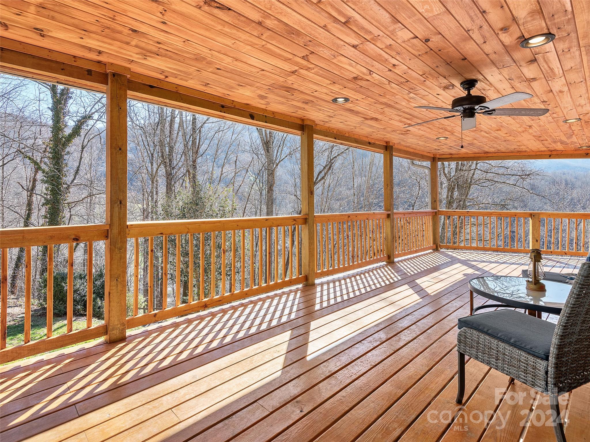 251 Jade Drive Clyde, NC 28721 - Photo 28 of 40 a view of a balcony with wooden floor