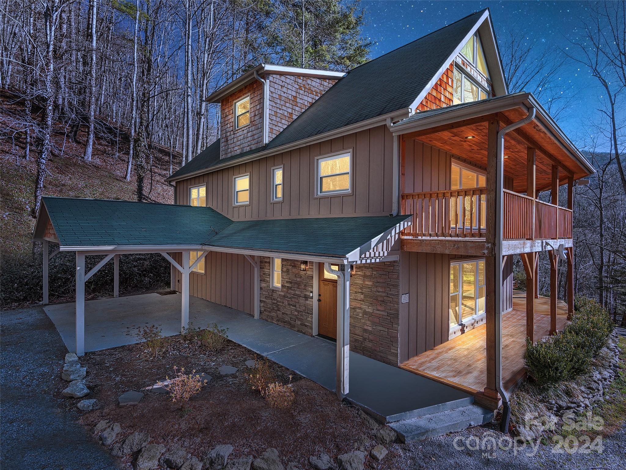 251 Jade Drive Clyde, NC 28721 - Photo 3 of 40 a view of a house with a street
