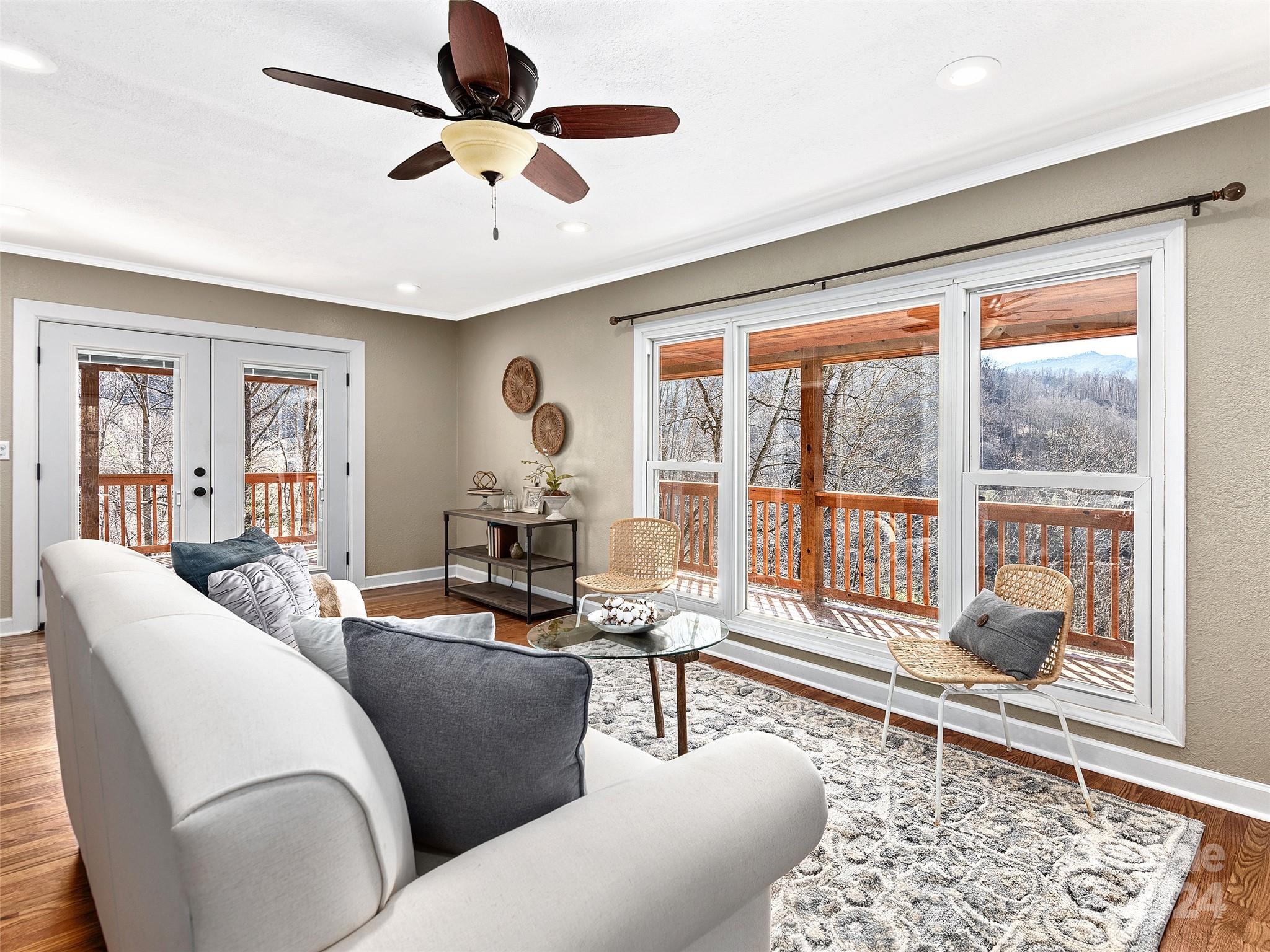 251 Jade Drive Clyde, NC 28721 - Photo 6 of 40 a living room with furniture and a large window
