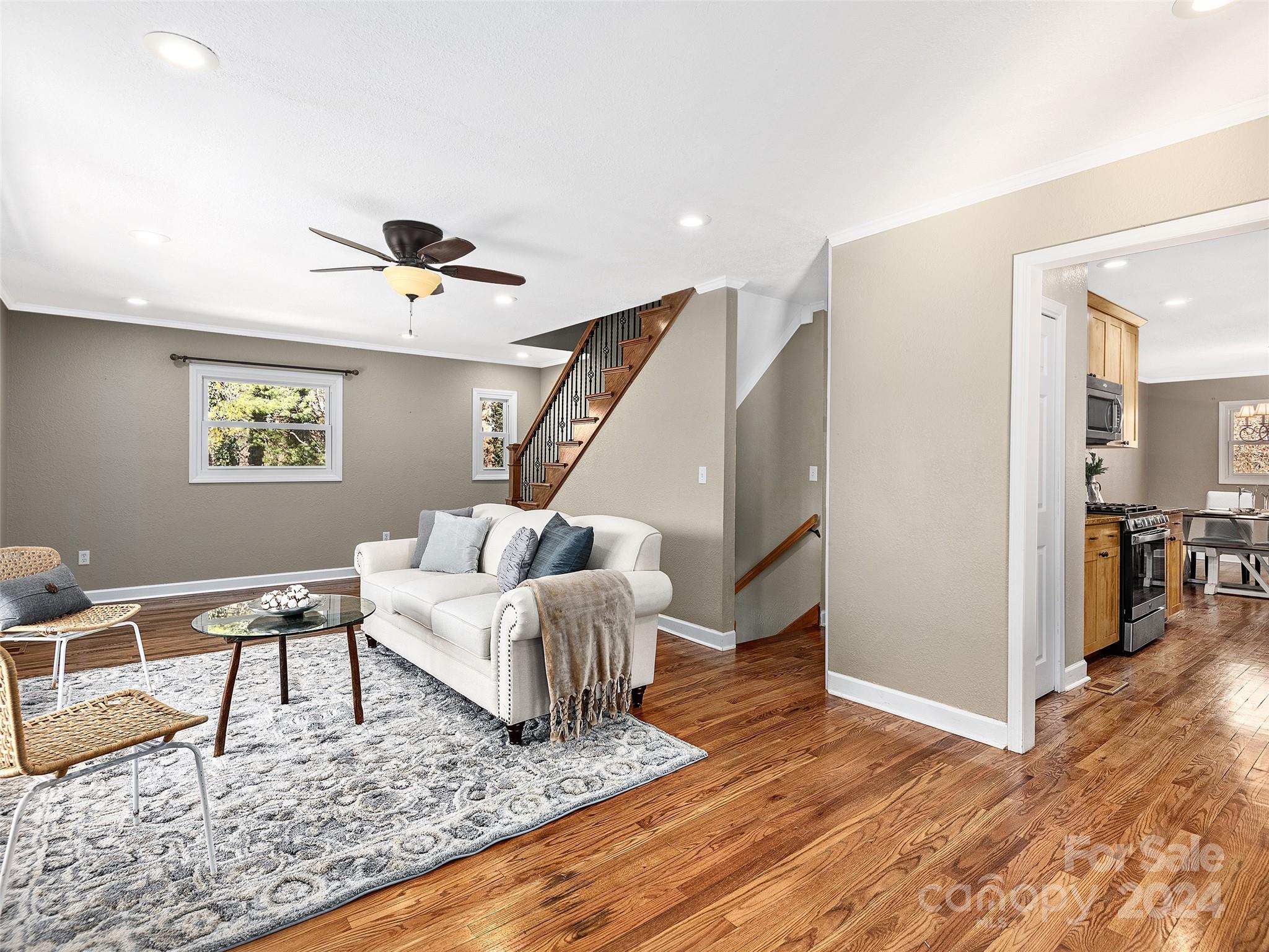 251 Jade Drive Clyde, NC 28721 - Photo 7 of 40 a living room with furniture and a wooden floor