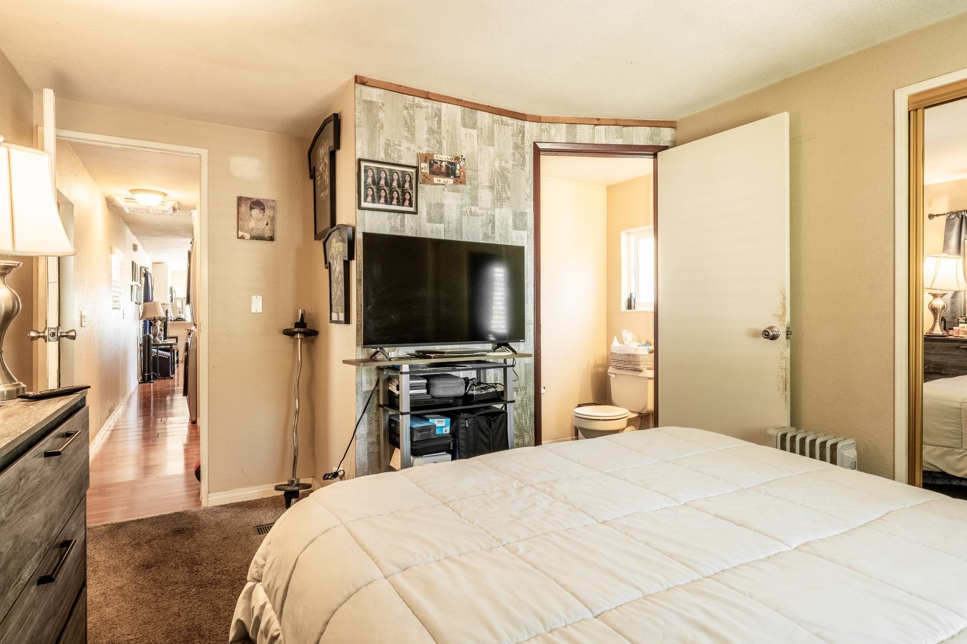 515 South Landing Road Crowley Lake, CA 93546 - Photo 22 of 41 a bedroom with a bed and a flat screen tv