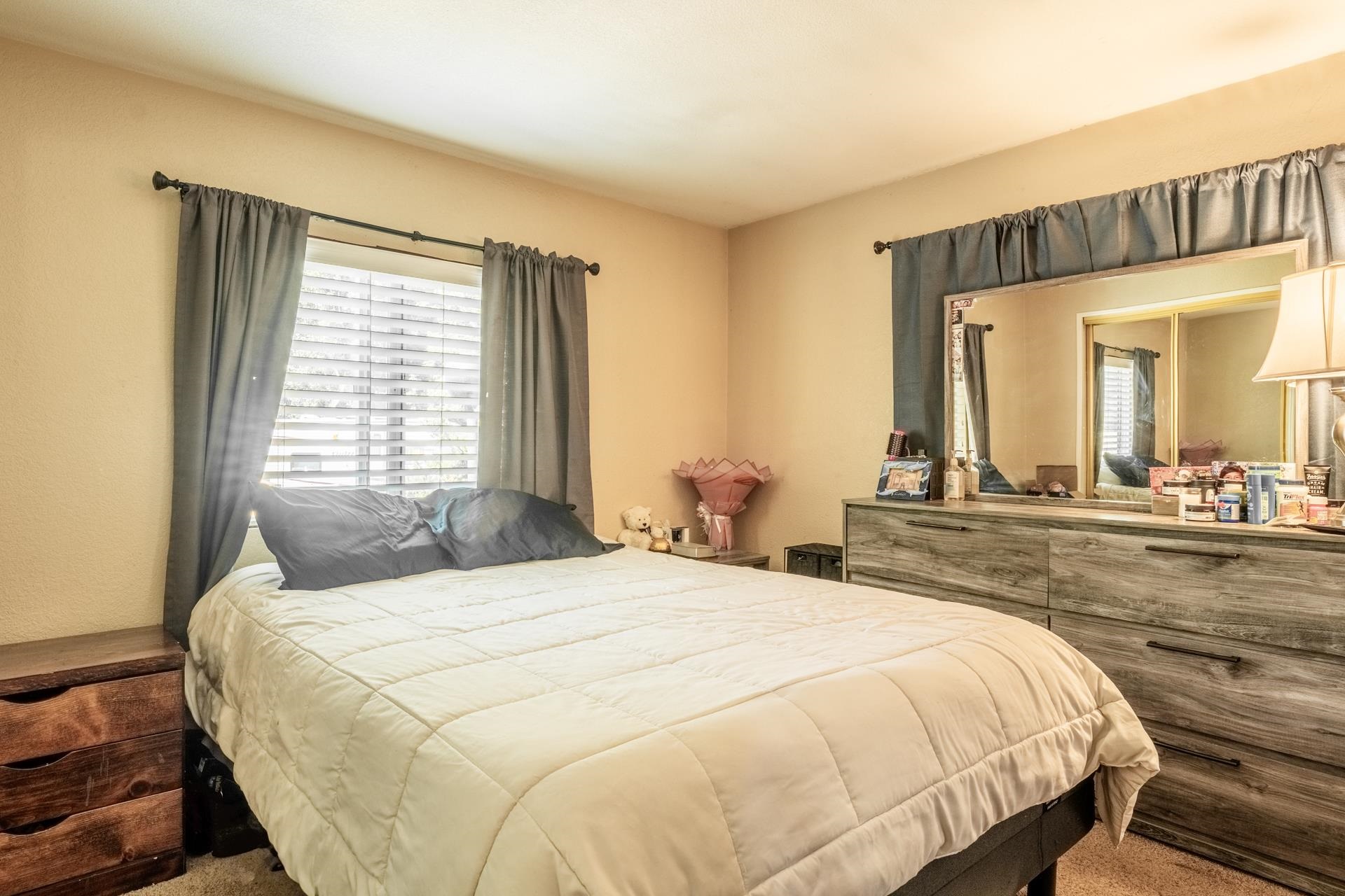 515 South Landing Road Crowley Lake, CA 93546 - Photo 23 of 41 a bedroom with a bed and a large mirror on dresser