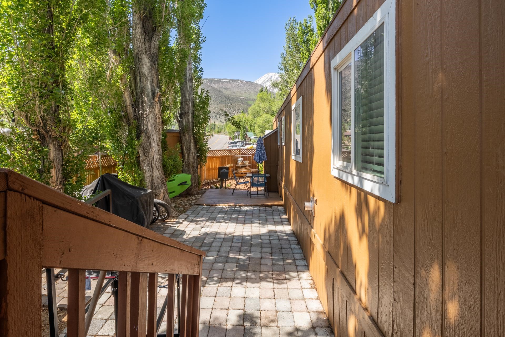 515 South Landing Road Crowley Lake, CA 93546 - Photo 35 of 41 a view of a house with a tree beside it