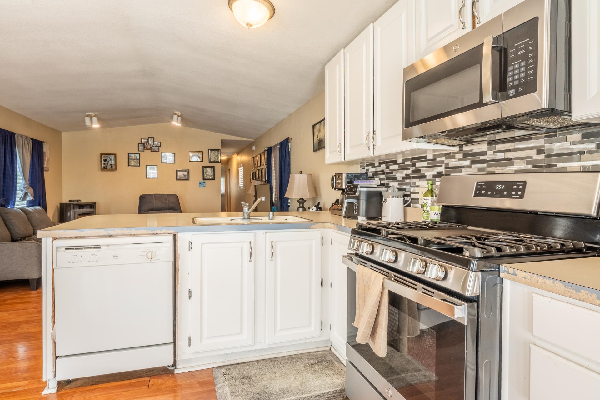 515 South Landing Road Crowley Lake, CA 93546 - Photo 9 of 41 a kitchen with stainless steel appliances granite countertop a stove and a sink