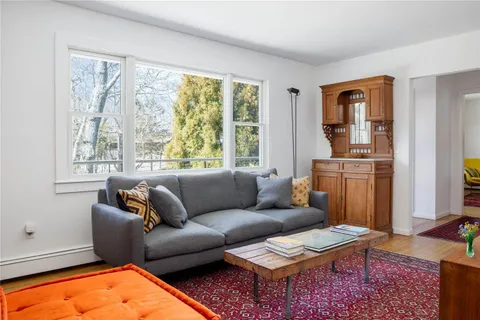 a living room with furniture and a window
