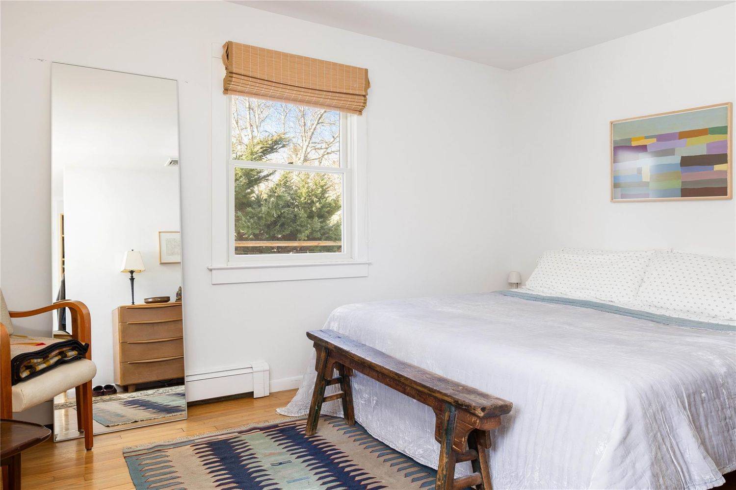 2 Captains Walk East Hampton, NY 11937 - Photo 10 of 22 a bedroom with a bed and a dresser next to a window