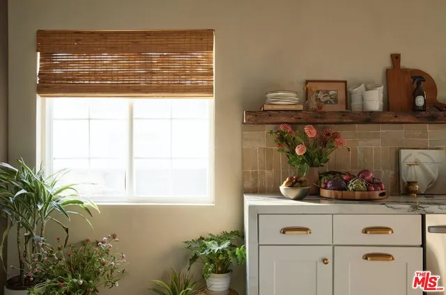a vase of flowers sitting on a table