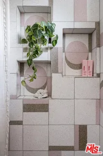 a bathroom with a bathtub and shower