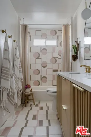 a bathroom with a sink and a shower