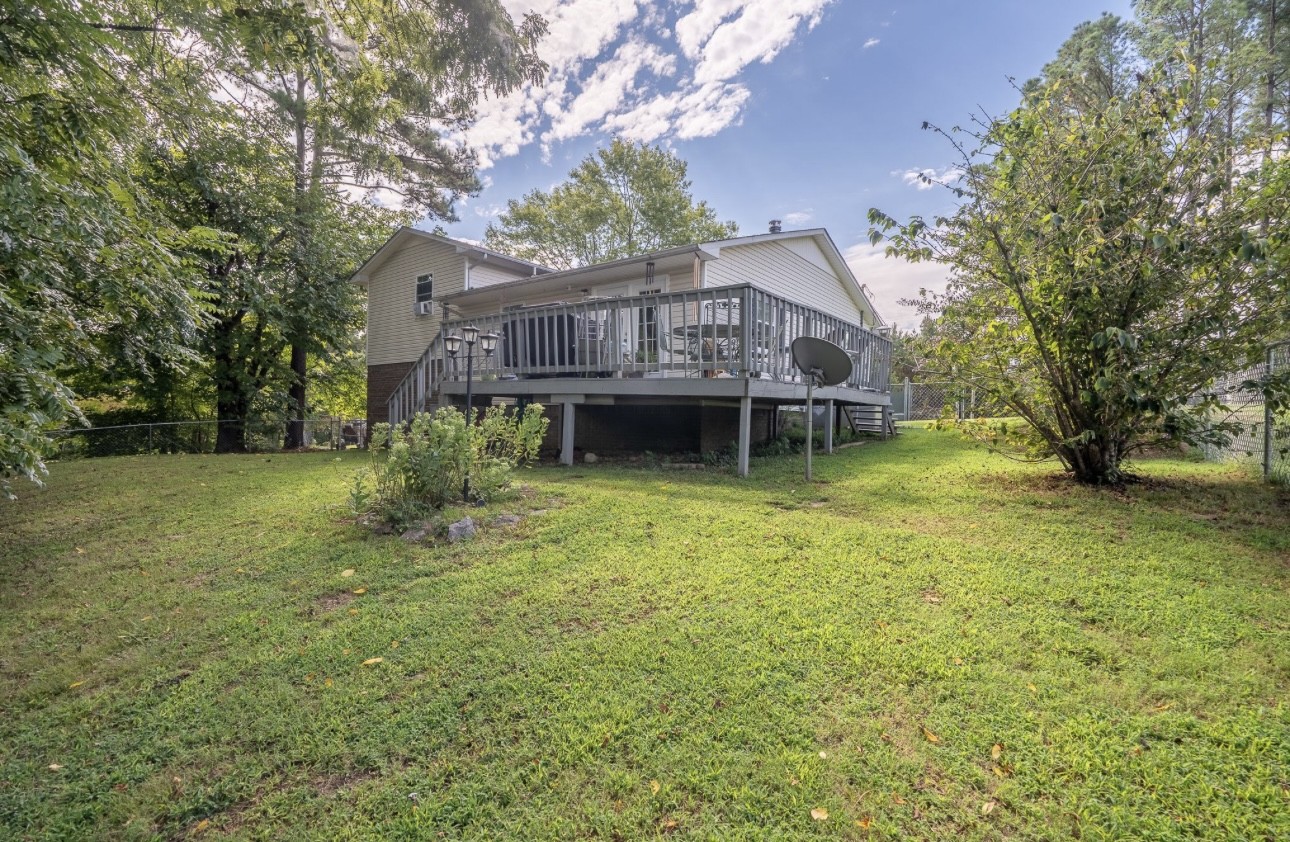 652 Old Florence Pulaski Road Leoma, TN 38468 - Photo 4 of 20 a front view of a house with garden