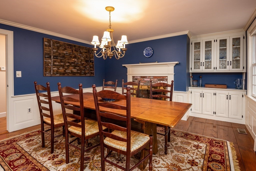 170 Saddle Hill Road Hopkinton, MA 01748 - Photo 11 of 31 a view of a dining room with furniture