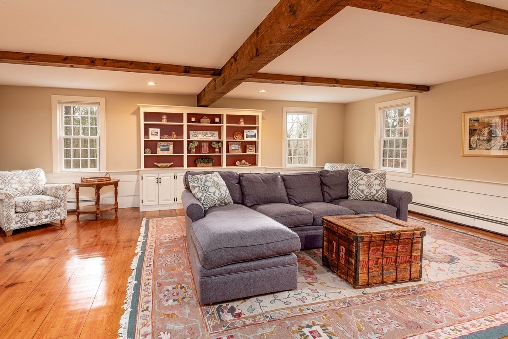 170 Saddle Hill Road Hopkinton, MA 01748 - Photo 17 of 31 a living room with furniture and a large window