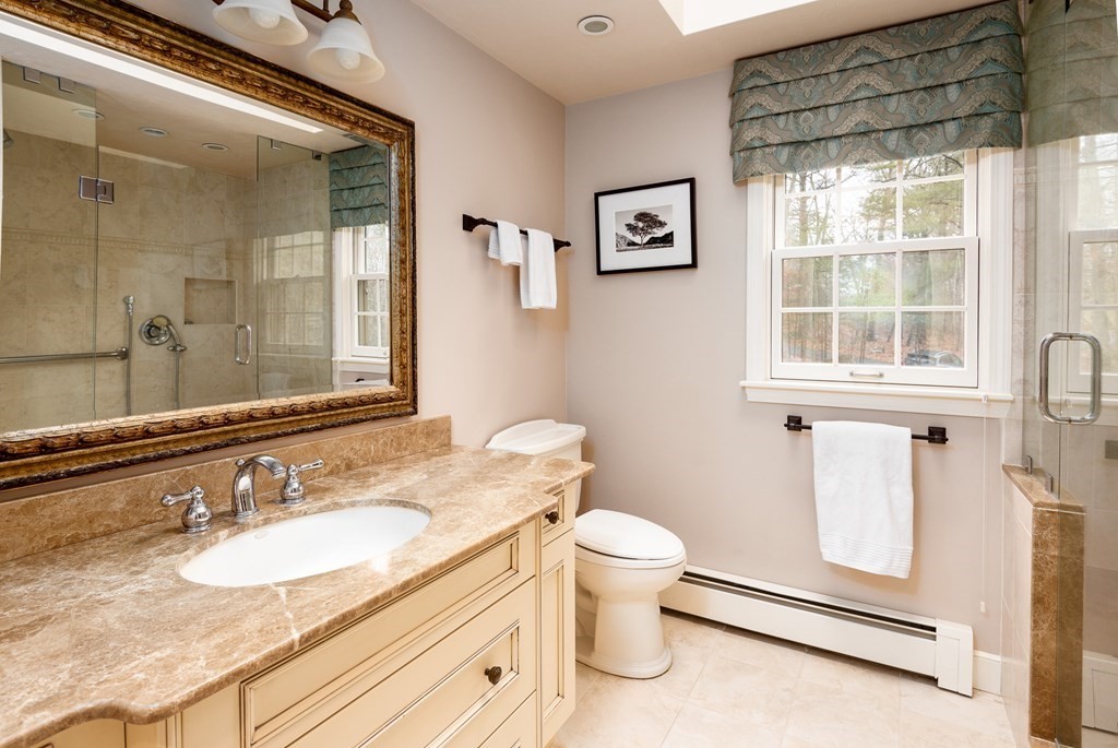 170 Saddle Hill Road Hopkinton, MA 01748 - Photo 19 of 31 a bathroom with a granite countertop sink toilet and shower