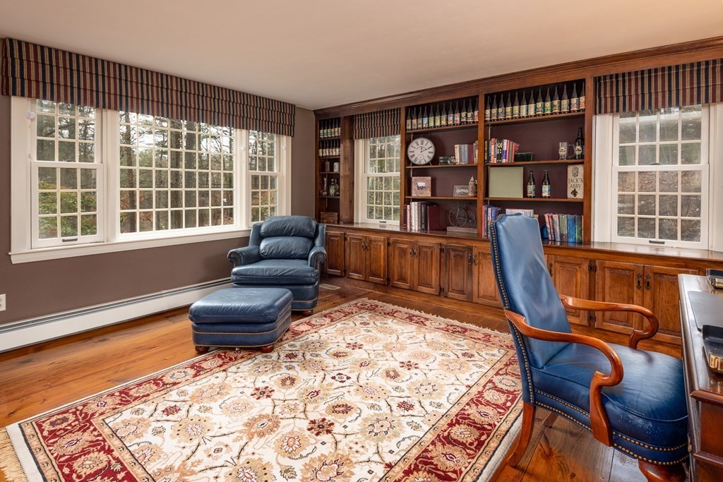 170 Saddle Hill Road Hopkinton, MA 01748 - Photo 8 of 31 a living room with furniture and a rug