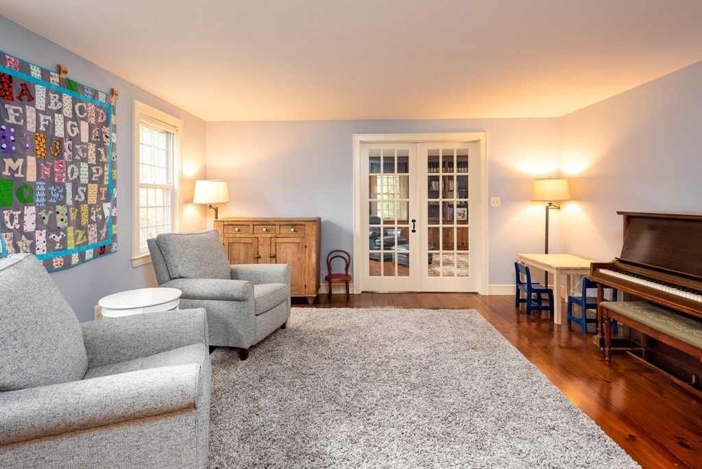 170 Saddle Hill Road Hopkinton, MA 01748 - Photo 9 of 31 a living room with furniture and a fireplace