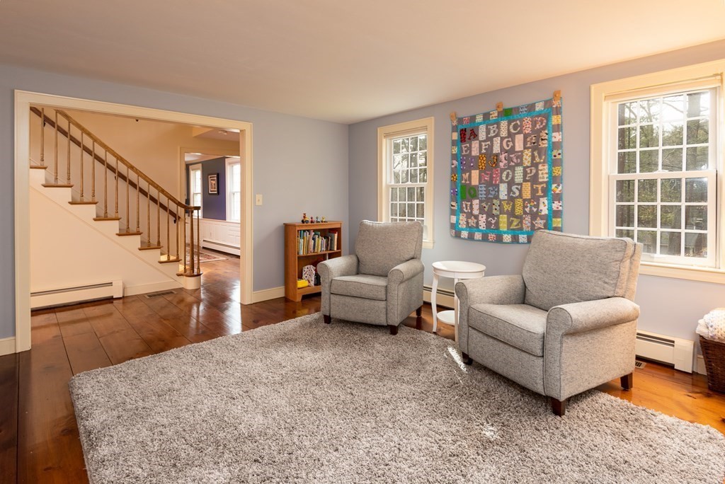 170 Saddle Hill Road Hopkinton, MA 01748 - Photo 10 of 31 a living room with furniture and a large window