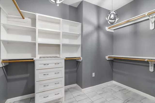 a view of an empty walk in closet