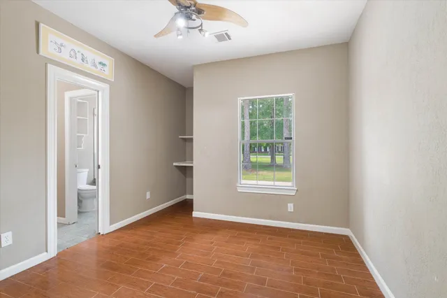 an empty room with windows