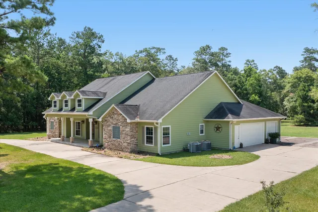 a house view with a garden space