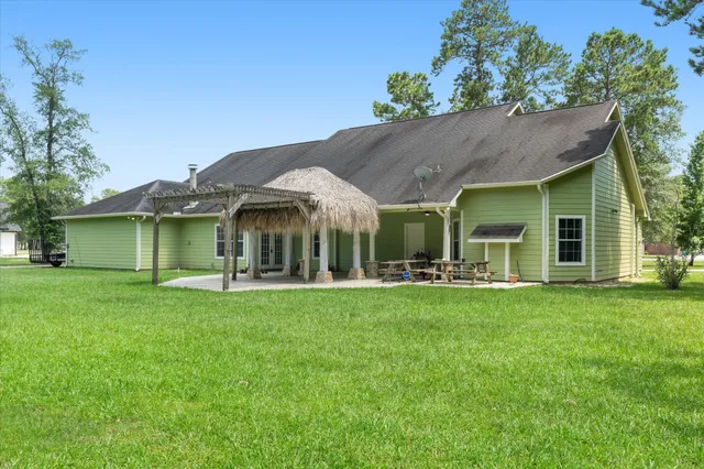 a front view of a house with a garden and porch