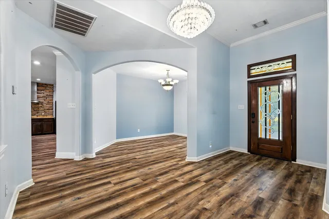 a view of a bedroom and a window