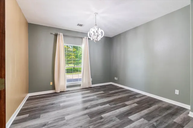 a view of an empty room with window