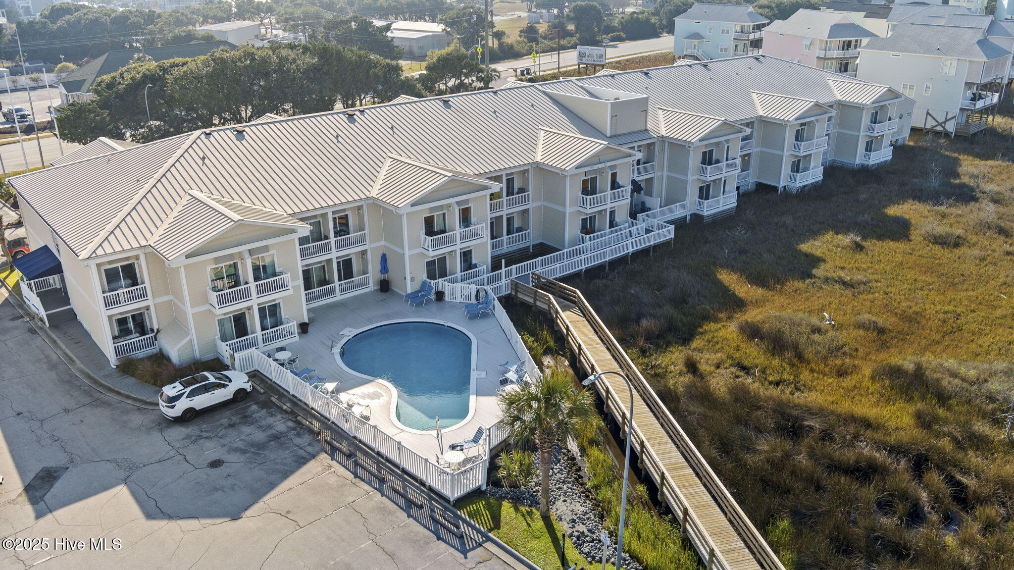 602 West Fort Macon Road, Unit 148 Atlantic Beach, NC 28512 - Photo 42 of 46 59-web-or-mls-148PalmSuites-Nov22-2025-0