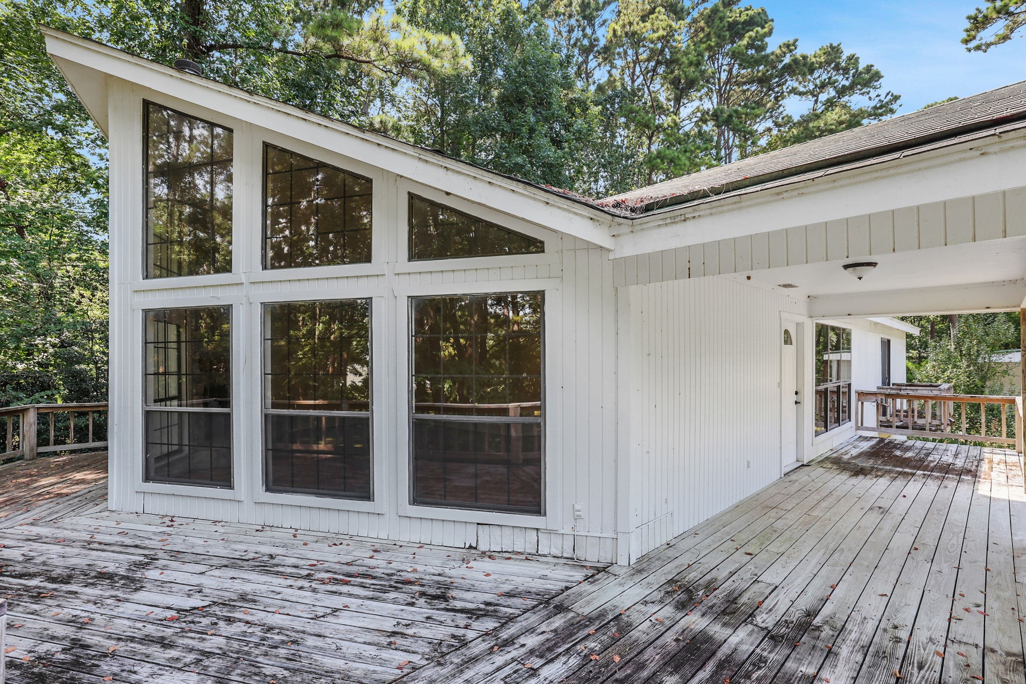 200 Johnson Road Coldspring, TX 77331 - Photo 9 of 47 This upper deck is a nice spot to relax and unwind