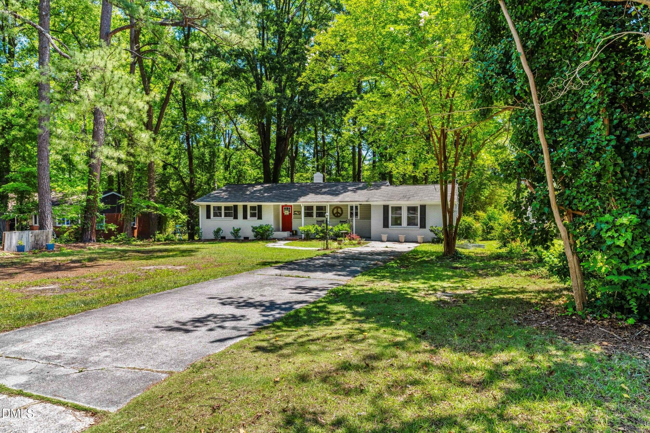 3724 Randell Road Garner, NC 27529 - Photo 2 of 32 a view of a house with a big yard