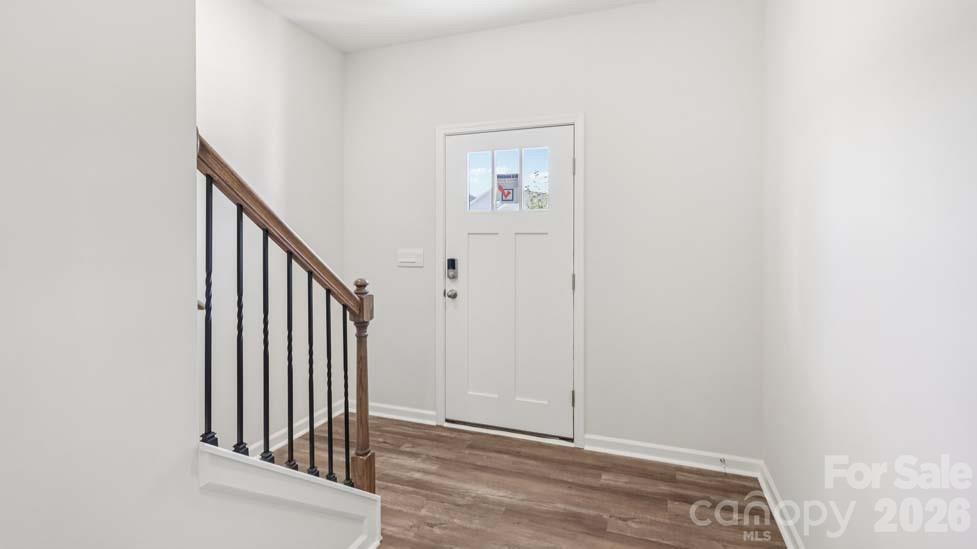 170 Old Home Road Statesville, NC 28677 - Photo 2 of 40 a view of a hallway with wooden floor and entryway