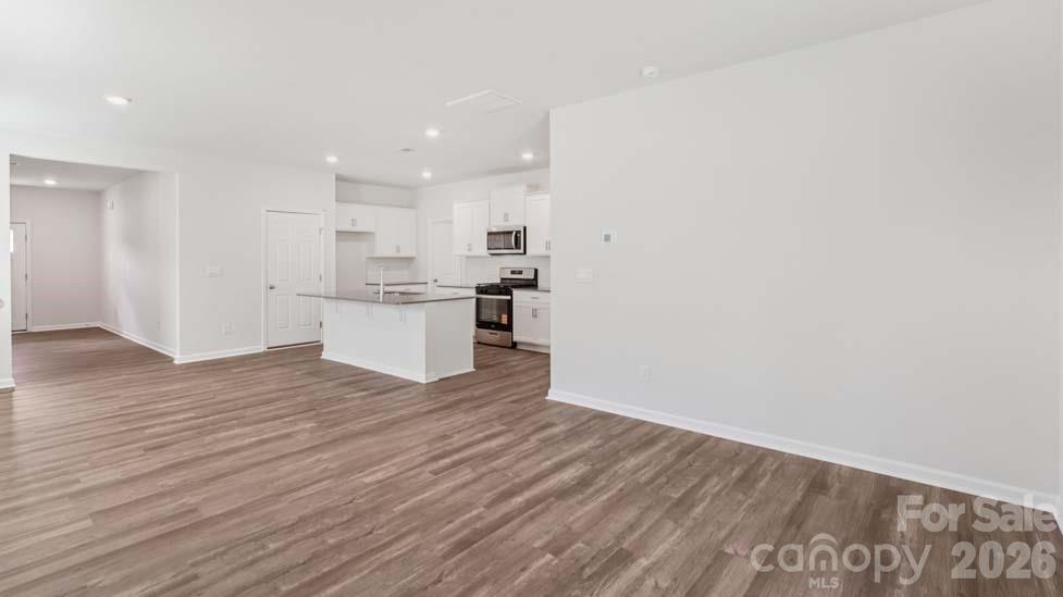 170 Old Home Road Statesville, NC 28677 - Photo 9 of 40 a view of a kitchen with wooden floor and a sink