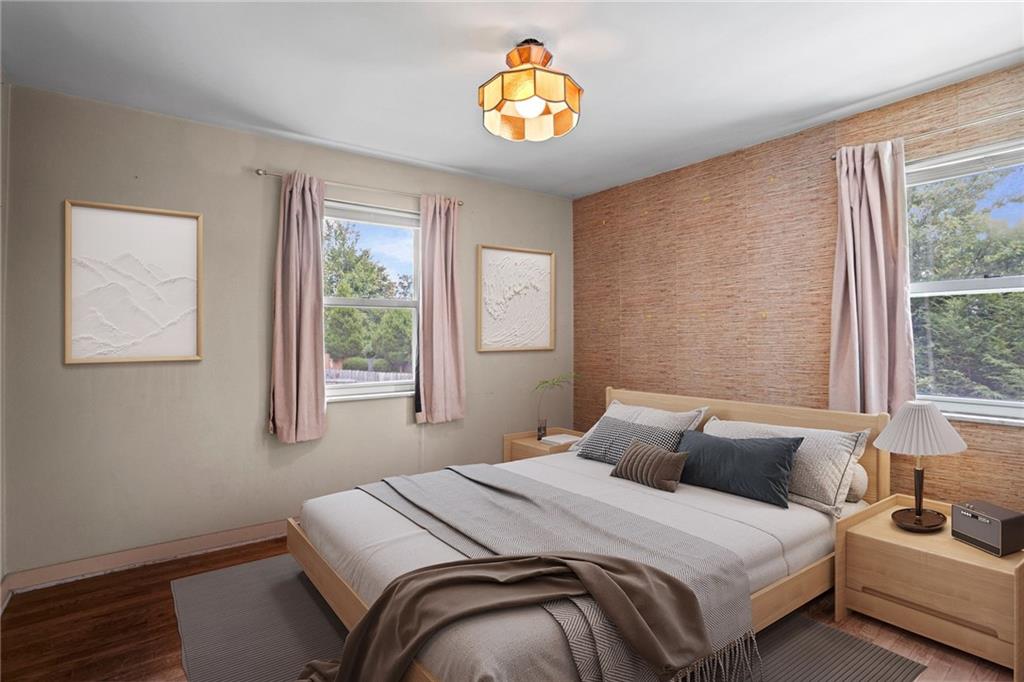 3323 Shady Ave Extension Pittsburgh, PA 15217 - Photo 22 of 45 a bedroom with a bed and a window