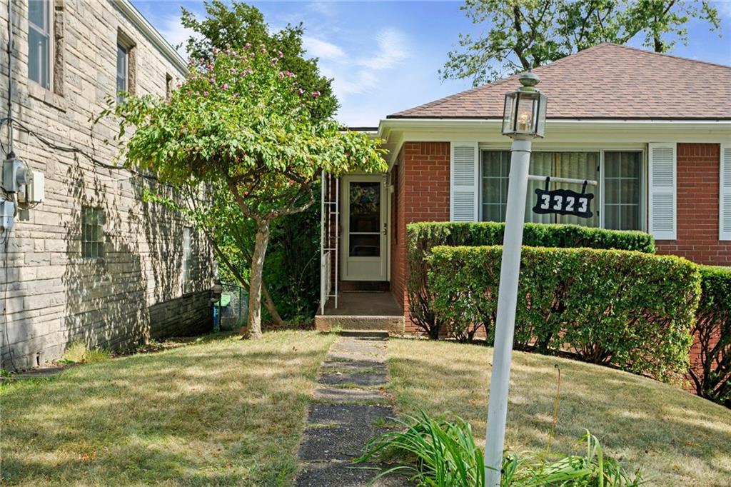 3323 Shady Ave Extension Pittsburgh, PA 15217 - Photo 3 of 45 front view of a house with a yard