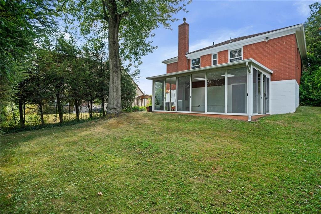 3323 Shady Ave Extension Pittsburgh, PA 15217 - Photo 37 of 45 a front view of a house with a garden