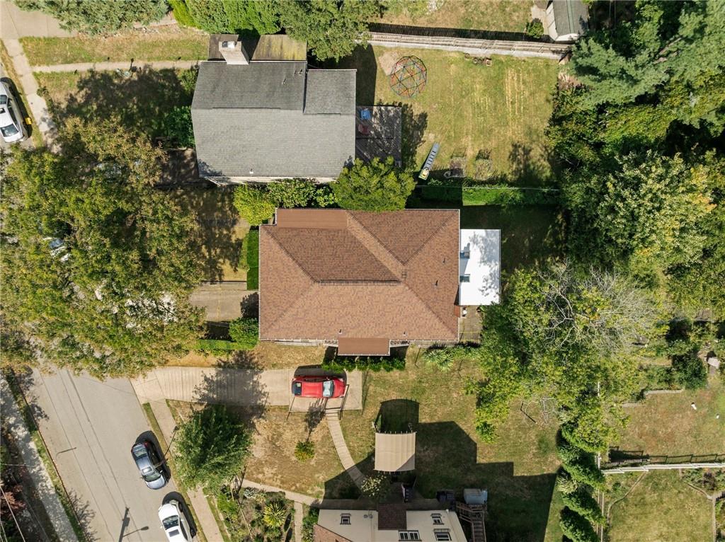 3323 Shady Ave Extension Pittsburgh, PA 15217 - Photo 42 of 45 an aerial view of a house with swimming pool and large trees