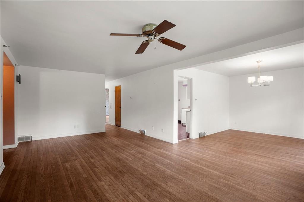 3323 Shady Ave Extension Pittsburgh, PA 15217 - Photo 8 of 45 a view of empty room with wooden floor and ceiling fan