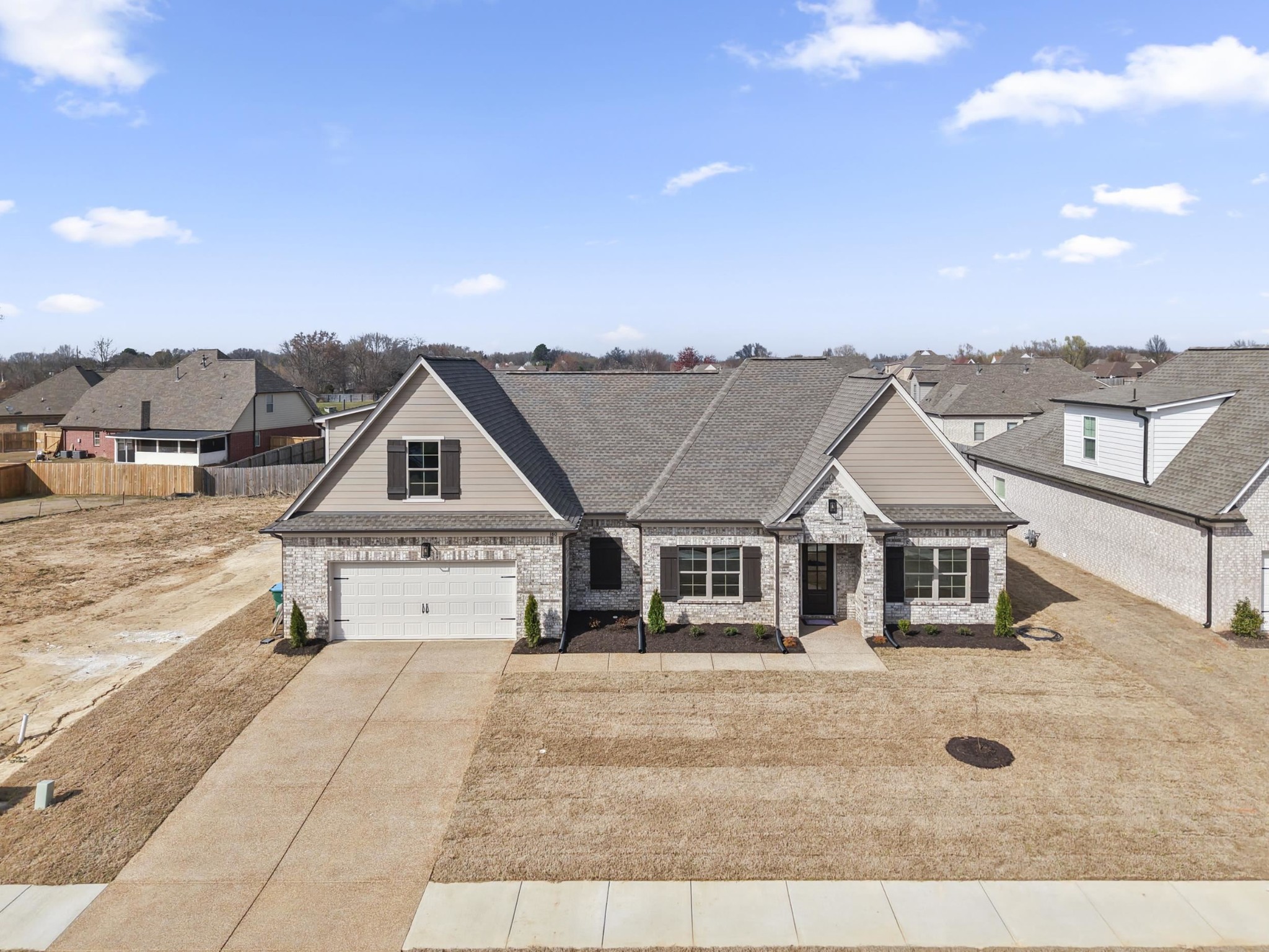 180 Oakland Rdg Cove Oakland, TN 38060 - Photo 2 of 27 a view of a house with a outdoor space