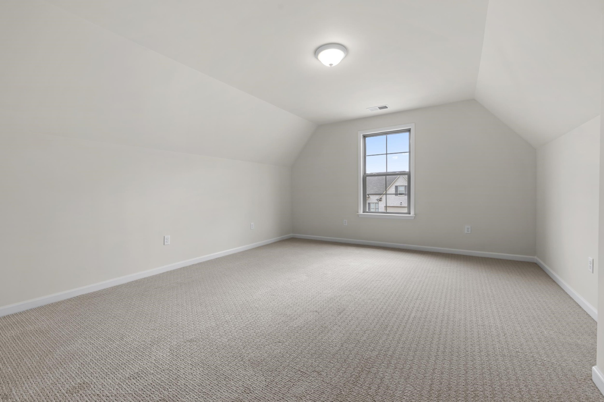 180 Oakland Rdg Cove Oakland, TN 38060 - Photo 22 of 27 an empty room with a window