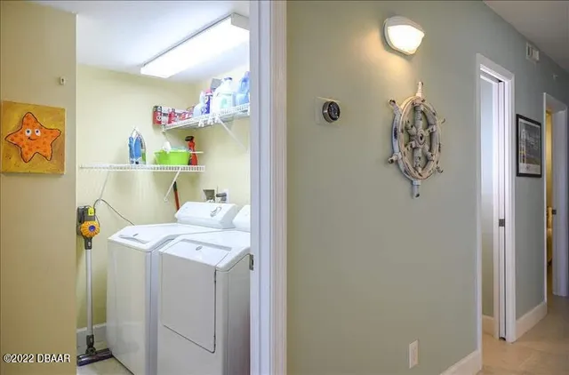 a view of a balcony with a yard