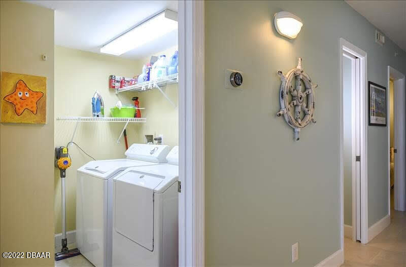 4555 South Atlantic Avenue, Unit 4207 Ponce Inlet, FL 32127 - Photo 27 of 33 a utility room with dryer and washer