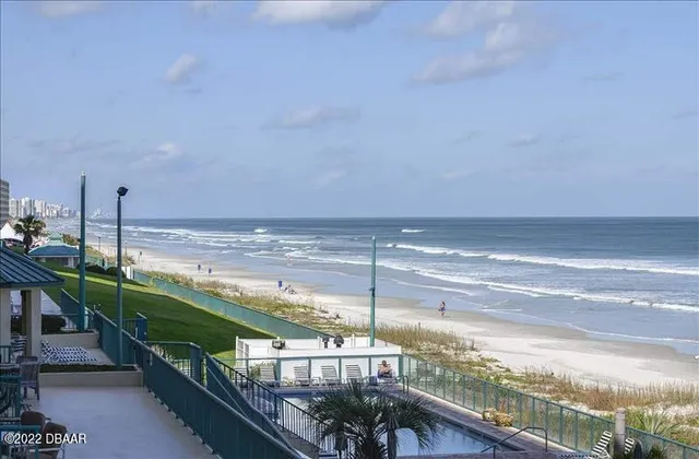 a view of a balcony with chairs